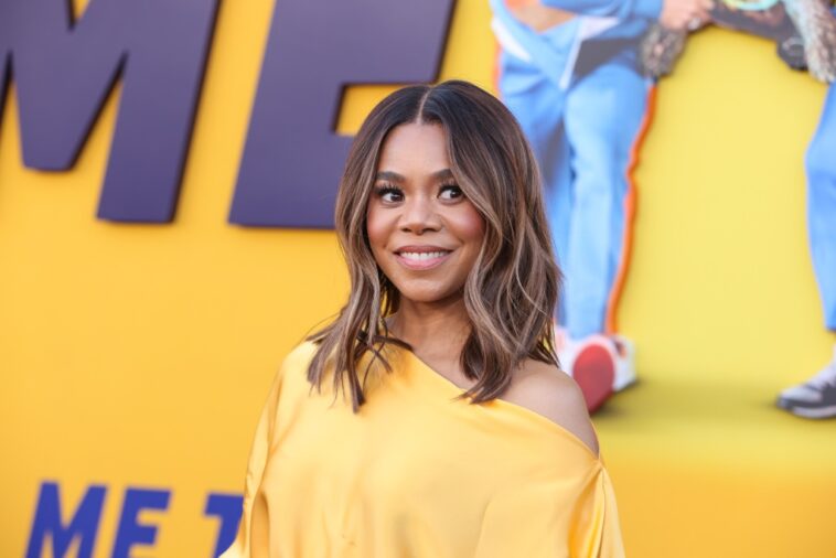 Regina Hall Dazzles in Yellow Silk Top and Feathered Aliétte Skirt at ‘Me Time’ Premiere