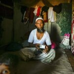 A man shows his UNHCR ID card at the Rohingya refugee settlement area in Kalindi Kunj (Photo: PTI)