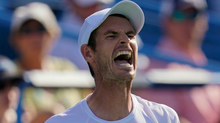 Andy Murray, of Britain, reacts during a first-round match against Mikael Ymer, of Sweden, at the Citi Open tennis tournament in Washington, Monday, Aug. 1, 2022. (AP Photo/Carolyn Kaster)