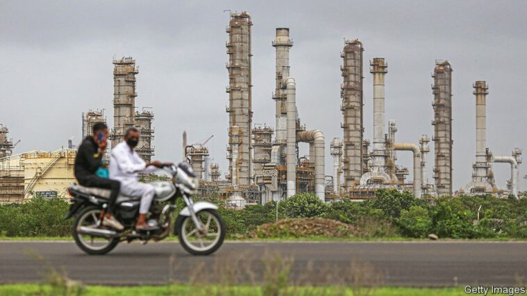 The Reliance Industries Ltd. oil refinery in Jamnagar, Gujarat, India, on Saturday, July 31, 2021. The Indian city of Jamnagar is a money-making machine for Asia's richest man, Mukesh Ambani, processing crude oil into fuel, plastics and chemicals at the world's biggest oil refining complex that can produce 1.4 million barrels of petroleum a day. Photographer: Dhiraj Singh/Bloomberg via Getty Images