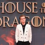 British actor Tom Glynn-Carney poses on the red carpet upon arrival to attend the HBO original drama series