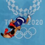 An overview shows Uzbekistan's Bakhodir Jalolov (red) and USA's Richard Torrez Jr fighting during their men's super heavy (over 91kg) boxing final bout during the Tokyo 2020 Olympic Games at the Kokugikan Arena in Tokyo on August 8, 2021