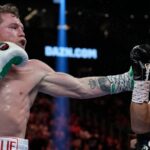 Canelo Alvarez, left, fights Gennady Golovkin in a super middleweight title boxing match, Saturday, Sept. 17, 2022, in Las Vegas. (AP Photo/John Locher)