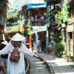 Hanoi, train street cafes in Hanoi, Hanoi train street cafes, Hanoi railway street, indian express news