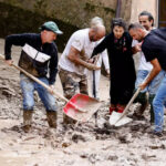 Floods in Italy kill 10; Survivors plucked from roofs, trees