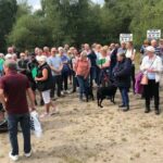 Hundreds stage protest against housing development