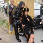 Kanye West Attends Burberry Show in Glitter Flip-flops With Socks On