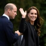 Britain's William, Prince of Wales and Kate, Princess of Wales wave as they view floral tributes left by members of the public, in memory of late Queen Elizabeth II, at the Sandringham Estate, in Norfolk, England, Thursday, Sept. 15, 2022. Queen Elizabeth II, Britain's longest-reigning monarch died Thursday Sept. 8, 2022, after 70 years on the throne. (Toby Melville/Pool via AP)