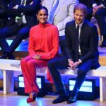 Meghan Markle Returns to the U.K. in Her Business as Usual Uniform