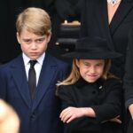 LONDON, ENGLAND - SEPTEMBER 19: Prince George of Wales and Princess Charlotte of Wales during the State Funeral of Queen Elizabeth II at Westminster Abbey on September 19, 2022 in London, England. Elizabeth Alexandra Mary Windsor was born in Bruton Street, Mayfair, London on 21 April 1926. She married Prince Philip in 1947 and ascended the throne of the United Kingdom and Commonwealth on 6 February 1952 after the death of her Father, King George VI. Queen Elizabeth II died at Balmoral Castle in Scotland on September 8, 2022, and is succeeded by her eldest son, King Charles III. (Photo by Karwai Tang/WireImage)