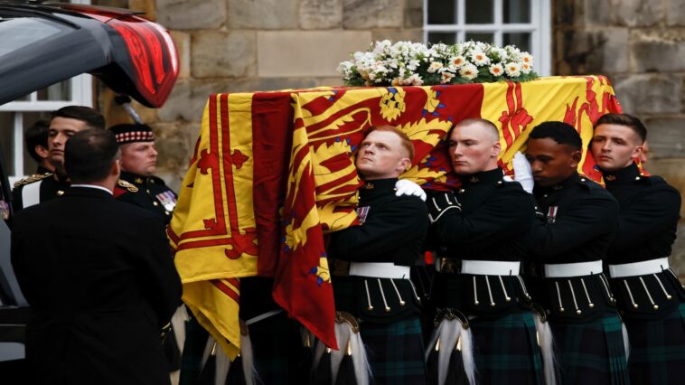 Queen Elizabeth's coffin arrives in Edinburgh as mourners line streets