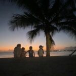 Single mum moves to Barbados for digital nomad life where her 3 kids now spend evenings swimming with turtles