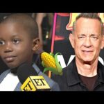 Viral 'Corn Kid' DOESN'T KNOW Who Tom Hanks Is at Pinocchio Premiere! (Exclusive)