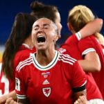 Natasha Harding celebrates at full time after Wales reached the World Cup play-offs