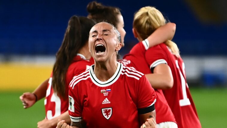 Natasha Harding celebrates at full time after Wales reached the World Cup play-offs