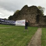 'Abhorrent' anti-immigration leaflets posted and banner held up in front of tower