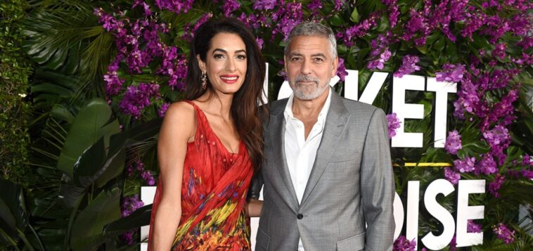 Amal Clooney Wears Playful Patterns in Red Chevron Alexander McQueen Dress for ‘Ticket to Paradise’ Premiere