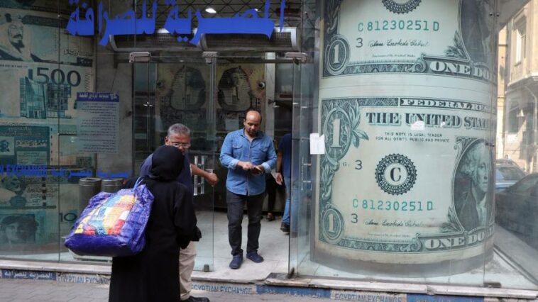 Egypt reaches $3bn IMF loan deal after agreeing to float currency