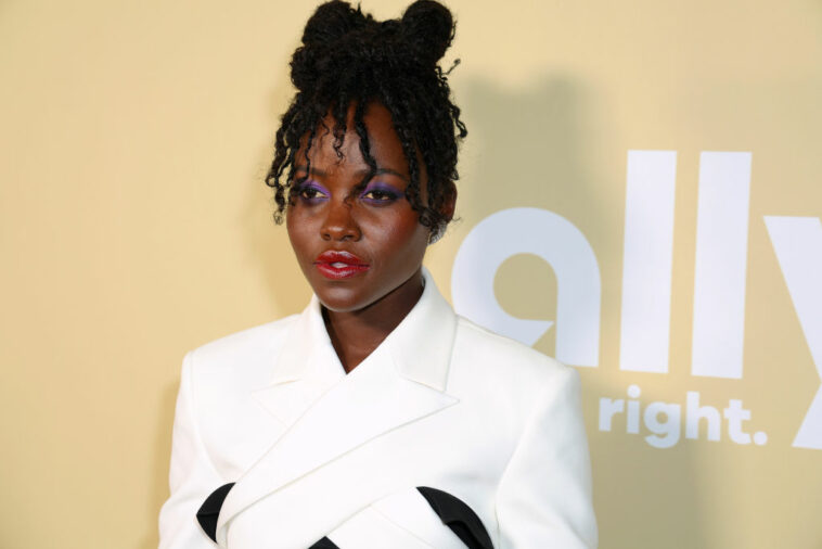 Lupita Nyong’o Brings Power Dressing to Ebony’s Power 100 Gala in Ashlyn Jumpsuit With ‘Black Panther’ Cast