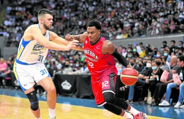 Justin Brownlee (right) keeps delivering for the Gin Kings. —PBA IMAGES