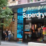 Superdry Shares Leap as UK Fashion Brand Returns to Profit