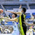 Poy Erram (middle) and TNT kick off their Commissioner’s Cup campaign against Ian Sangalang (left), Rafi Reavis and Magnolia. —PBA IMAGES