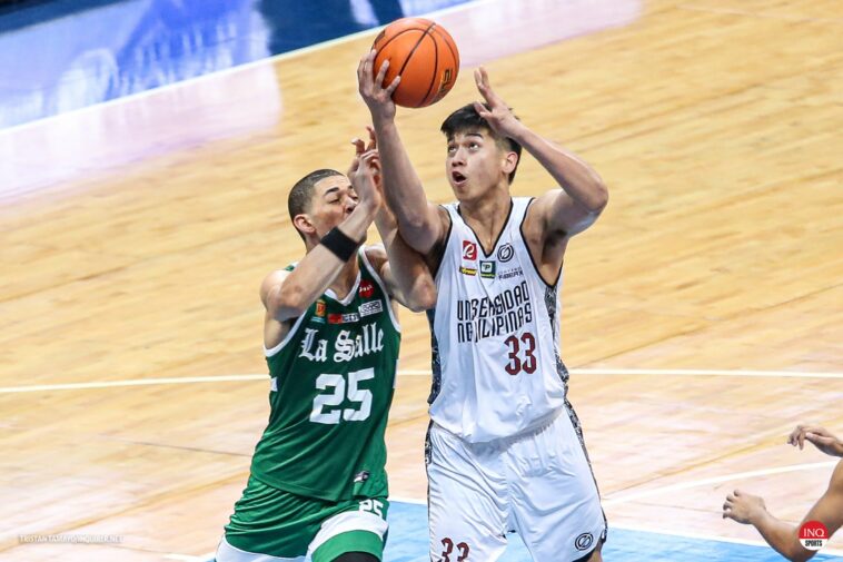 UP's Carl Tamayo against La Salle's Michael Phillips.