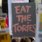 UK protesters burn energy bills over PM Truss' mini budget