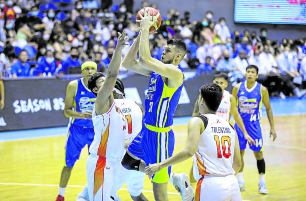 Nick Rakocevic (right) is averaging 30 points and close to 19 rebounds in the first five games for Magnolia. —PBA IMAGES