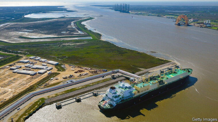 The Asia Vision LNG carrier ship sits docked at the Cheniere Energy Inc. terminal in this aerial photograph taken over Sabine Pass, Texas, U.S., on Wednesday, Feb. 24, 2016. Cheniere said in a statement last month. Cheniere Energy Inc. expects to ship the first cargo of liquefied natural gas on Wednesday to Brazil with another tanker to be loaded a few days later, marking the historic start of U.S. shale exports and sending its shares up the most in more than a month. Photographer: Lindsey Janies/Bloomberg via Getty Images