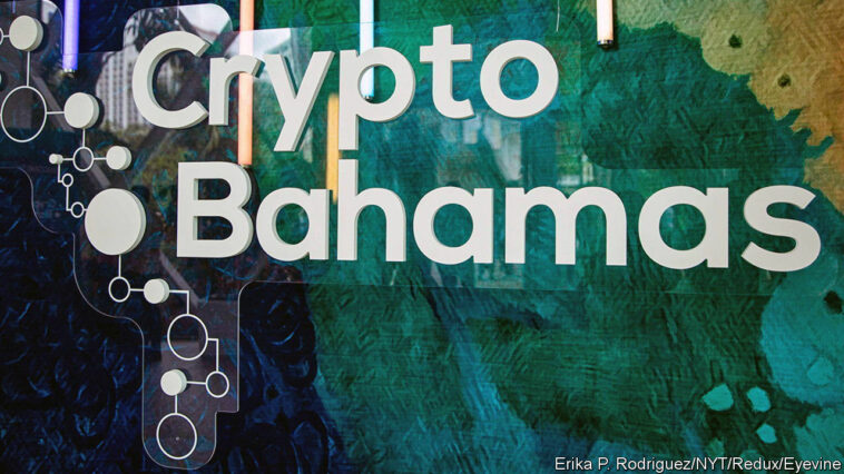 Logo for the conference at the entrance to the Conventions Center in the Crypto Bahamas conference at the Baha Mar Resort in Nassau, New Providence Island, Bahamas, on April 27, 2022. Sam Bankman-Fried, the CEO of cryptocurrency exchange company FTX, will build their headquarters on the island. The invite-only event was put together by FTX and SALT.(Erika P. Rodriguez/The New York Times)Credit: New York Times / Redux / eyevineFor further information please contact eyevinetel: +44 (0) 20 8709 8709e-mail: info@eyevine.comwww.eyevine.com