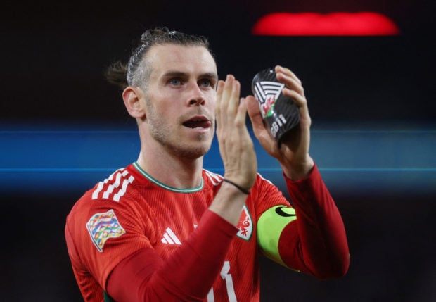 FILE PHOTO: Soccer Football - UEFA Nations League - Group D - Wales v Poland - Cardiff City Stadium, Cardiff, Wales, Britain - September 25, 2022 Wales' Gareth Bale applauds fans after the match