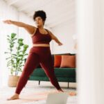 Healthy woman doing exercise at home