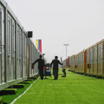 Employees prepare cabins at the Al-Emadi fan village in Doha on November 9, 2022, ahead of the Qatar 2022 FIFA World Cup football tournament. (Photo by Kirill KUDRYAVTSEV / AFP) (Photo by KIRILL KUDRYAVTSEV/AFP via Getty Images)