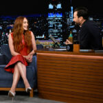 Lindsay Lohan Pops in Red Versace Dress for ‘Jimmy Fallon’ While Promoting ‘Falling for Christmas’