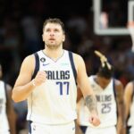 Luka Doncic #77 of the Dallas Mavericks reacts during the second half of the NBA game at Footprint Center on October 19, 2022 in Phoenix, Arizona.