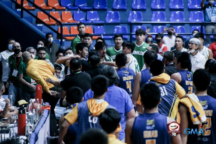 An ugly brawl between JRU Heavy Bombers and St. Benidle Blazers halted the NCAA Season 98 match. –NCAA PHOTO