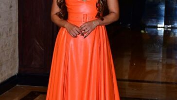 Priyanka Chopra shines bright in fluorescent orange dress; take a look