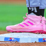 Aug 7, 2022; Arlington, Texas, USA; A view of the pink Adidas baseball shoes of Chicago White Sox left fielder Eloy Jimenez (74) during the fourth inning against the Texas Rangers at Globe Life Field. Mandatory Credit: Jerome Miron-USA TODAY Sports