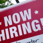 US unemployment claims fall, housing market suffers