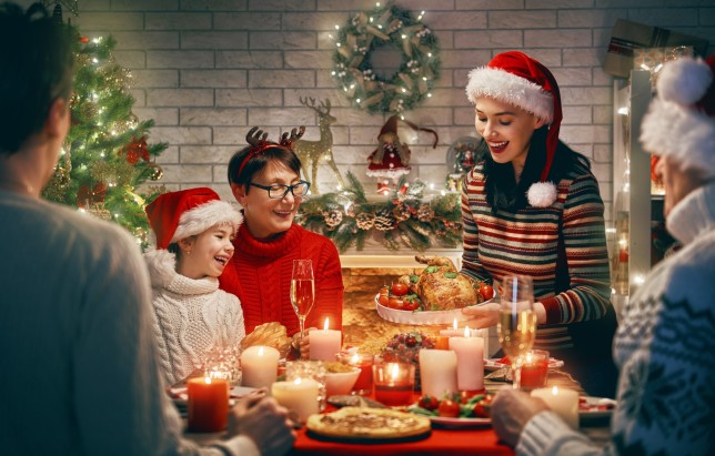 A family gathered around the table at Christmas.