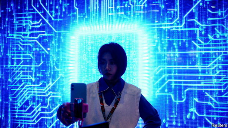 A woman visits a semiconductor device display at the Appliance and Electronics World Expo (AWE) in Shanghai, China March 23, 2021. REUTERS/Aly Song - RC2XGM9JWMY1