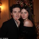 Lovebirds: Brooklyn Beckham, 23, took to Instagram on Saturday to share a slew of loved up snaps with wife Nicola Peltz, 27, as they enjoyed a lavish meal together on Christmas eve