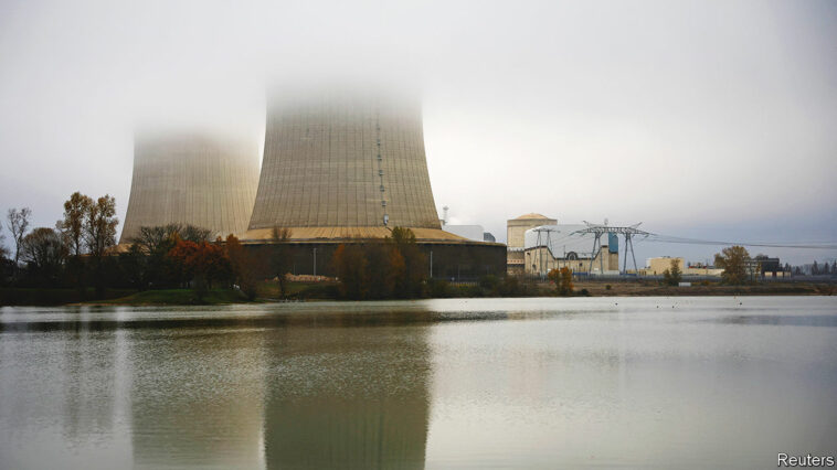 Cooling towers of the Electricite de France (EDF) nuclear power plant are pictured in Saint-Laurent-Nouan, France, November 10, 2022. REUTERS/Stephane Mahe