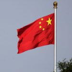 China sanctions former State Department official, congressional aide