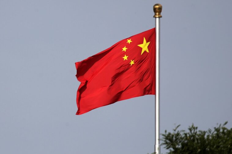 China sanctions former State Department official, congressional aide