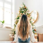 Woman in front of tree