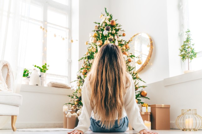 Woman in front of tree