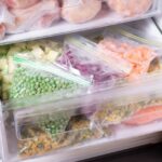 Assortment of frozen Vegetables in fridge. Frozen food in the freezer