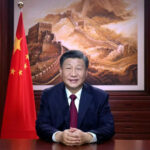 Troubles aside, Xi says China on 'right side of history'